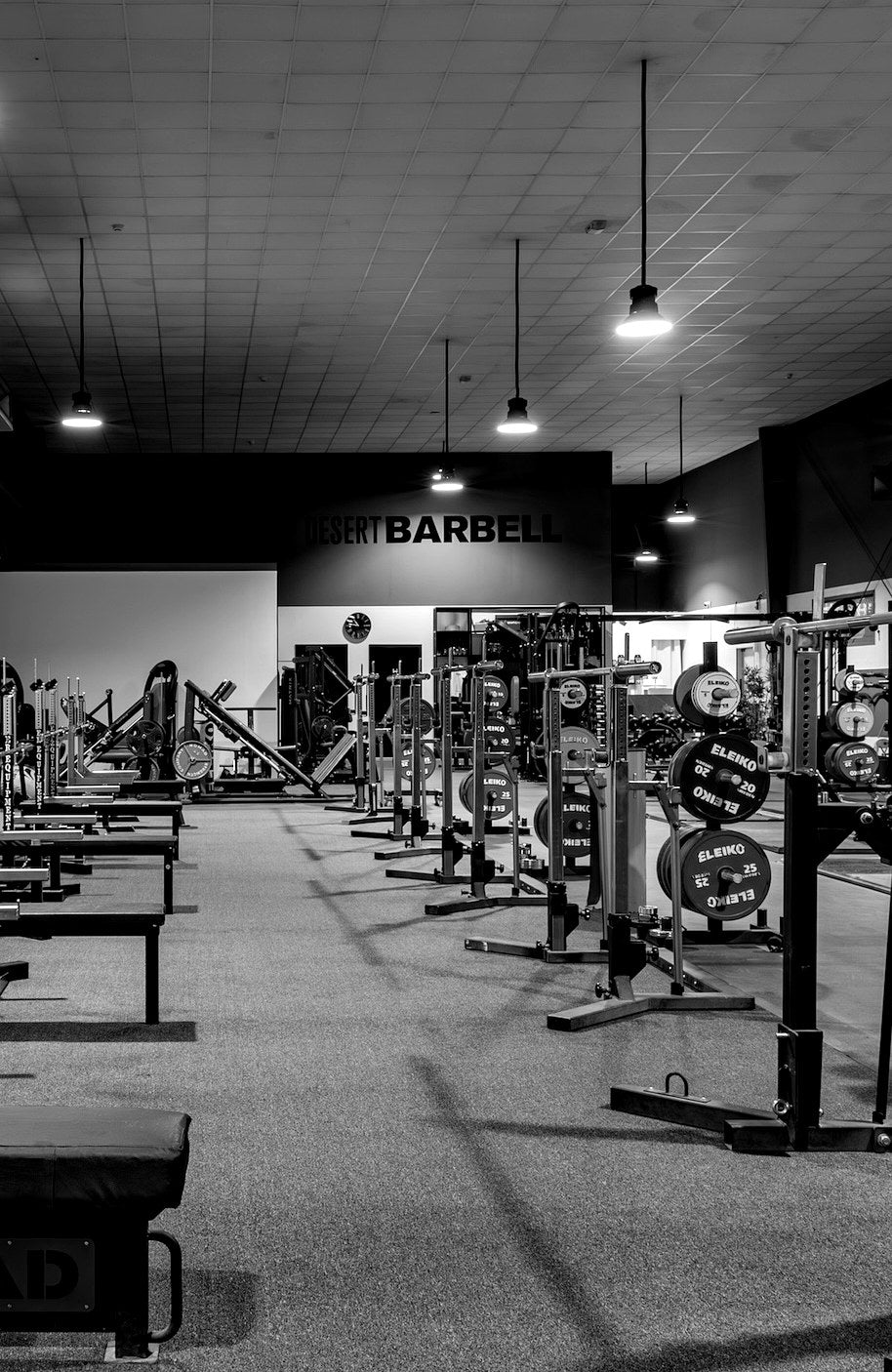 Squat racks and platforms on the training floor at Desert Barbell gym in Al Quoz Dubai